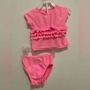Gap hot pink 2 piece swim suit with ruffles. Size 6-12 months.